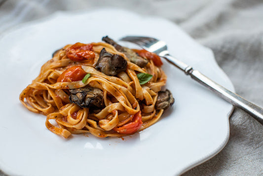 Pasta with tomato and smoked oysters