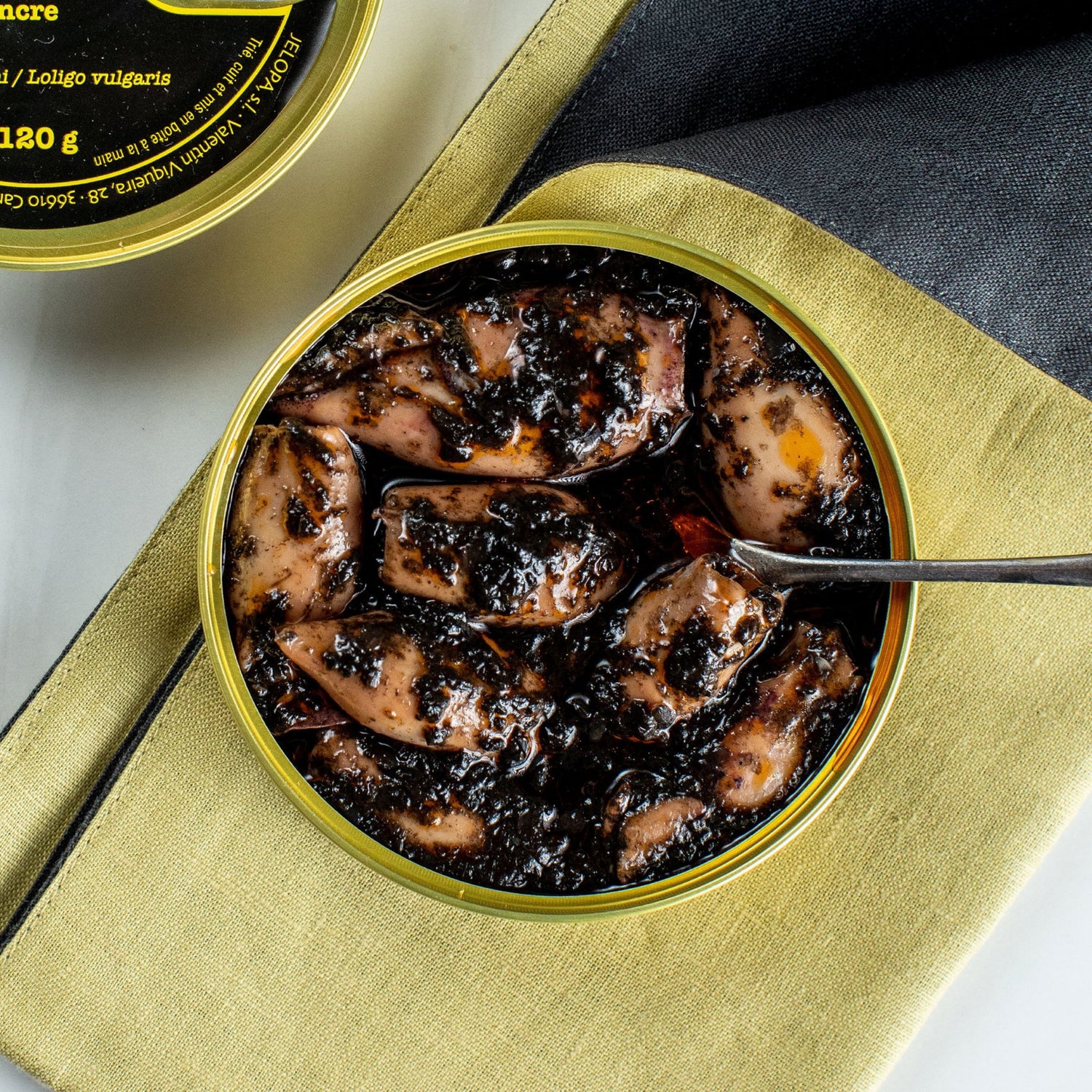 image of canned squid in its own ink