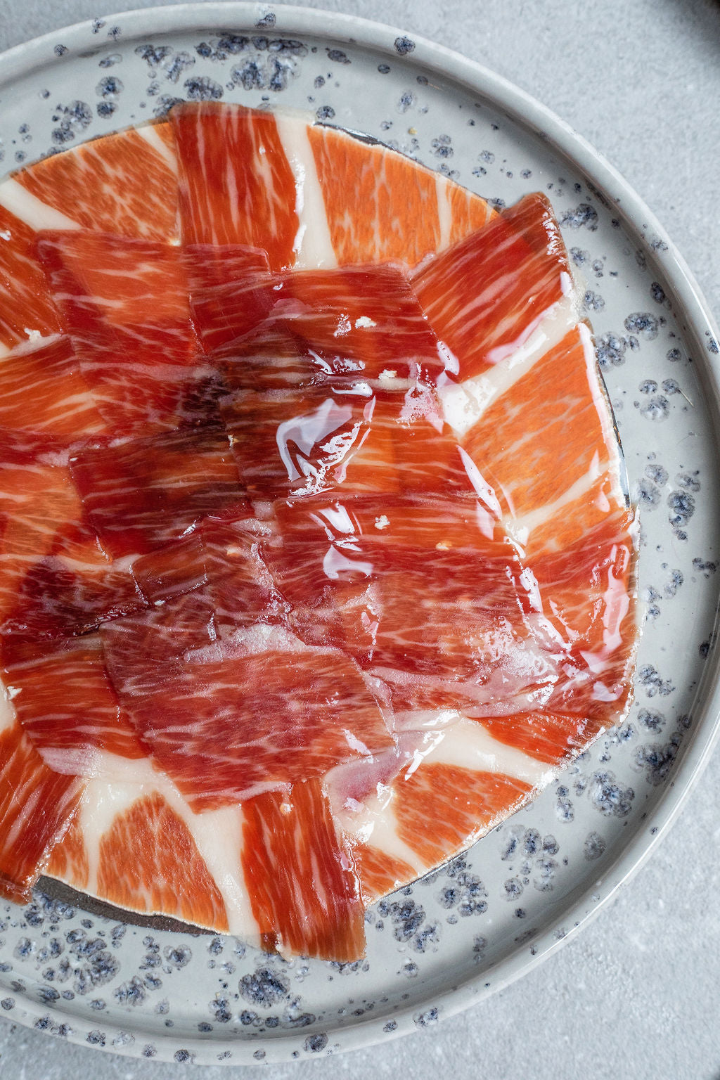 Iberico de Cebo Ham. Hand Carved at Spanish Pig (50% Iberico)